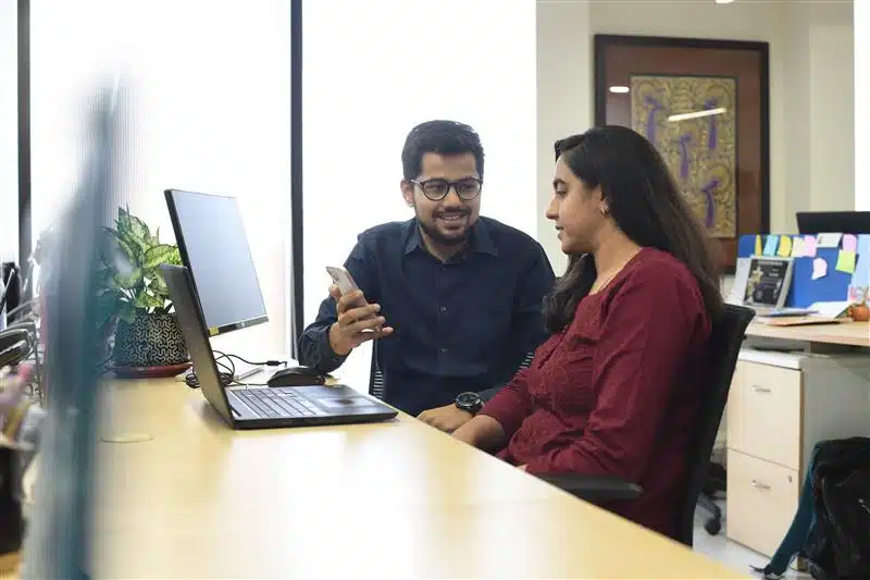 PMC employee testing software on different devices